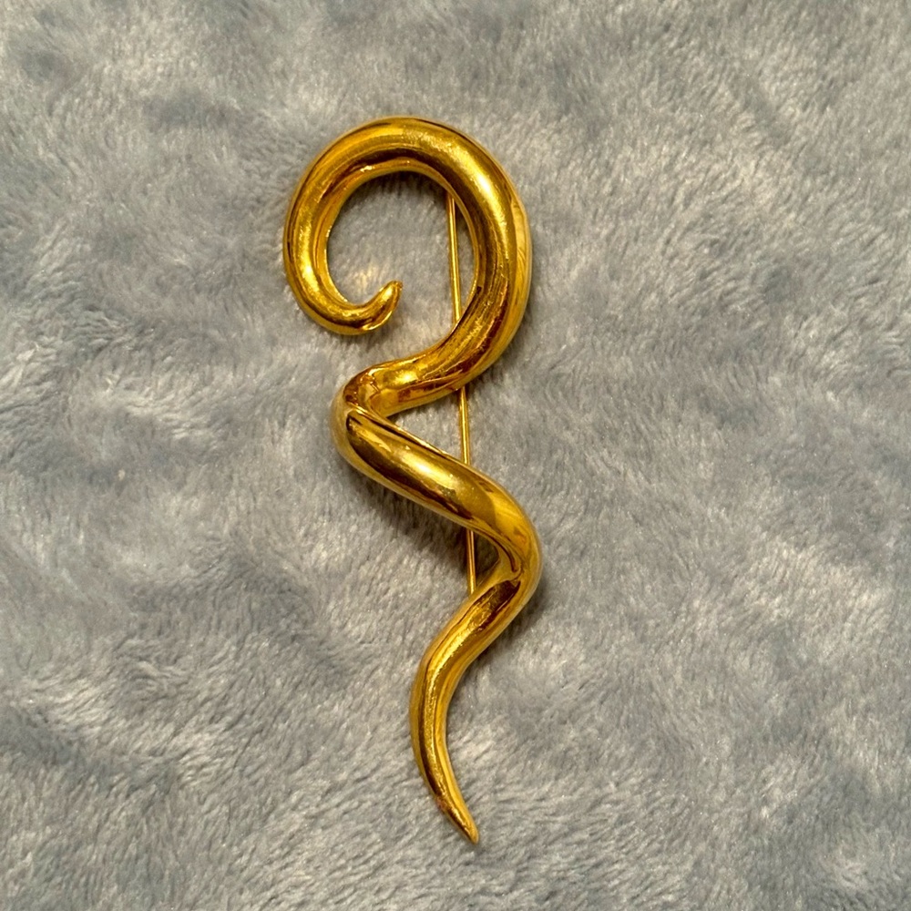 - Vintage Unstamped gold tone Polished Spiral/Swirl Brooch